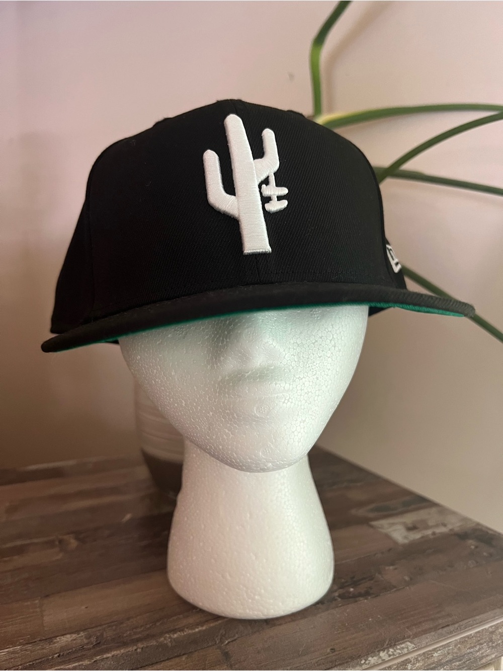 New Era Black Snapback Hat with Green Undervisor